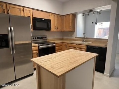 Just enough space to be comfortable in your second home.  Light on Canoa Hills Golf Course in Arizona - for sale on GolfHomes.com, golf home, golf lot