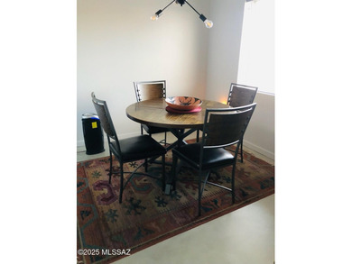 Just enough space to be comfortable in your second home.  Light on Canoa Hills Golf Course in Arizona - for sale on GolfHomes.com, golf home, golf lot