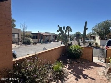 Just enough space to be comfortable in your second home.  Light on Canoa Hills Golf Course in Arizona - for sale on GolfHomes.com, golf home, golf lot