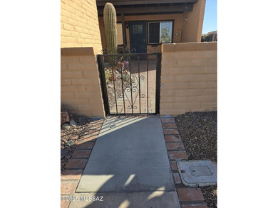 Just enough space to be comfortable in your second home.  Light on Canoa Hills Golf Course in Arizona - for sale on GolfHomes.com, golf home, golf lot