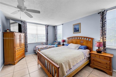 Wow! Beautiful 3-bed, 2-bath Corner Unit Condo That Overlooks on Pine Island Ridge Country Club in Florida - for sale on GolfHomes.com, golf home, golf lot