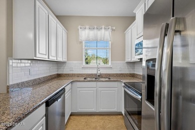 Enjoy maintenance-free living in this beautiful 2BR/2.5BA on LPGA International Golf Course in Florida - for sale on GolfHomes.com, golf home, golf lot