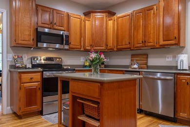 You're invited to experience a home where elegance feels on The Esquire Country Club in West Virginia - for sale on GolfHomes.com, golf home, golf lot