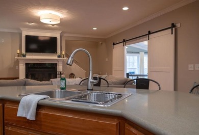 You're invited to experience a home where elegance feels on The Esquire Country Club in West Virginia - for sale on GolfHomes.com, golf home, golf lot