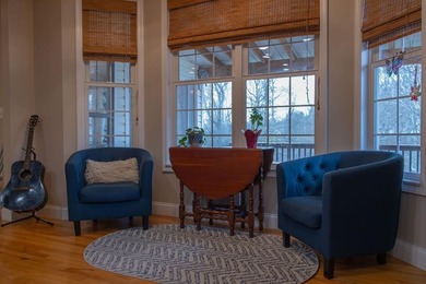 You're invited to experience a home where elegance feels on The Esquire Country Club in West Virginia - for sale on GolfHomes.com, golf home, golf lot