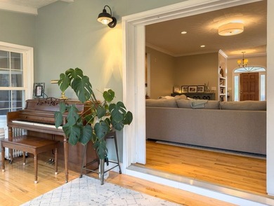 You're invited to experience a home where elegance feels on The Esquire Country Club in West Virginia - for sale on GolfHomes.com, golf home, golf lot