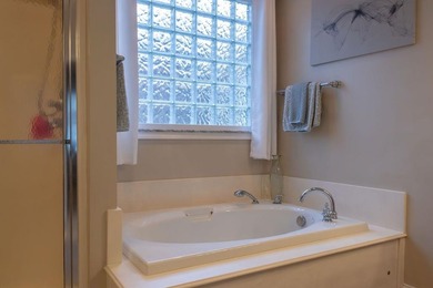 You're invited to experience a home where elegance feels on The Esquire Country Club in West Virginia - for sale on GolfHomes.com, golf home, golf lot