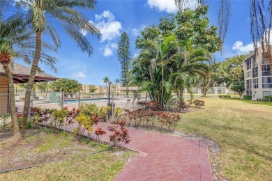Wow! Beautiful 3-bed, 2-bath Corner Unit Condo That Overlooks on Pine Island Ridge Country Club in Florida - for sale on GolfHomes.com, golf home, golf lot