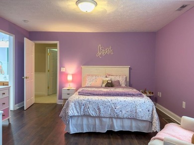 You're invited to experience a home where elegance feels on The Esquire Country Club in West Virginia - for sale on GolfHomes.com, golf home, golf lot