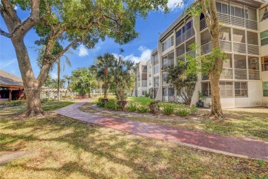 Wow! Beautiful 3-bed, 2-bath Corner Unit Condo That Overlooks on Pine Island Ridge Country Club in Florida - for sale on GolfHomes.com, golf home, golf lot