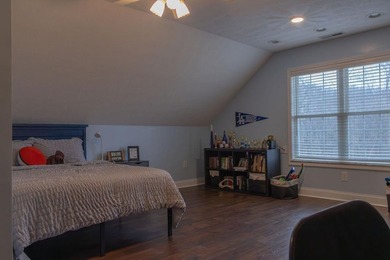 You're invited to experience a home where elegance feels on The Esquire Country Club in West Virginia - for sale on GolfHomes.com, golf home, golf lot