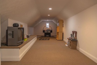 You're invited to experience a home where elegance feels on The Esquire Country Club in West Virginia - for sale on GolfHomes.com, golf home, golf lot