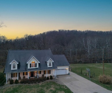 You're invited to experience a home where elegance feels on The Esquire Country Club in West Virginia - for sale on GolfHomes.com, golf home, golf lot