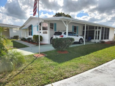 This charming home located in the desirable community of Heron on The Club At Pointe West in Florida - for sale on GolfHomes.com, golf home, golf lot