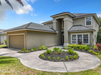 Prior model home featuring a finished air-conditioned garage and on St. Johns Golf and Country Club in Florida - for sale on GolfHomes.com, golf home, golf lot