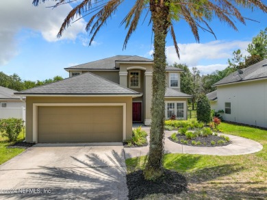 Prior model home featuring a finished air-conditioned garage and on St. Johns Golf and Country Club in Florida - for sale on GolfHomes.com, golf home, golf lot