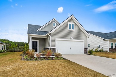 Experience refined coastal living in the prestigious Isles of on River Oaks Golf Plantation  in South Carolina - for sale on GolfHomes.com, golf home, golf lot