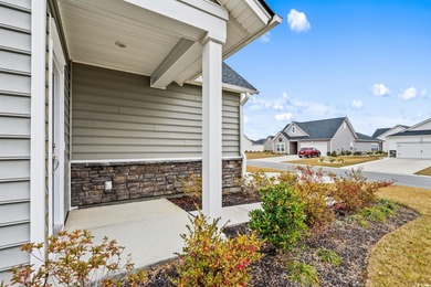 Experience refined coastal living in the prestigious Isles of on River Oaks Golf Plantation  in South Carolina - for sale on GolfHomes.com, golf home, golf lot