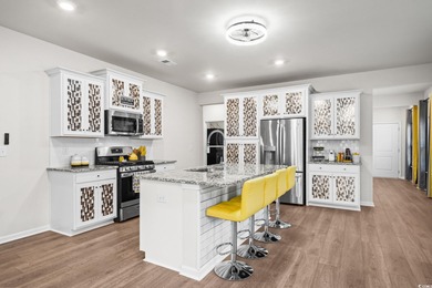 Experience refined coastal living in the prestigious Isles of on River Oaks Golf Plantation  in South Carolina - for sale on GolfHomes.com, golf home, golf lot