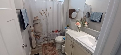 Come settle down and relax in a beautiful, manufactured home on Fairways Country Club in Florida - for sale on GolfHomes.com, golf home, golf lot