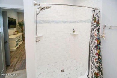 Dreaming of owning a cute beach house? Don't oversleep on this on Founders Club At St. James Plantation in North Carolina - for sale on GolfHomes.com, golf home, golf lot