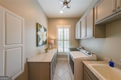 Experience timeless elegance in this stunning 5-bedroom, 5-bath on Polo Golf and Country Club in Georgia - for sale on GolfHomes.com, golf home, golf lot