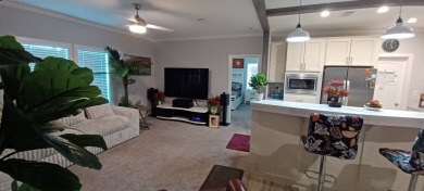 Come settle down and relax in a beautiful, manufactured home on Fairways Country Club in Florida - for sale on GolfHomes.com, golf home, golf lot