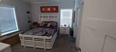 Come settle down and relax in a beautiful, manufactured home on Fairways Country Club in Florida - for sale on GolfHomes.com, golf home, golf lot