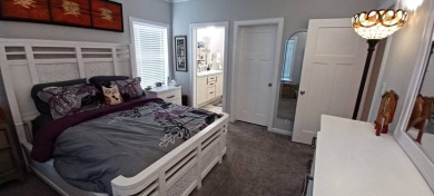 Come settle down and relax in a beautiful, manufactured home on Fairways Country Club in Florida - for sale on GolfHomes.com, golf home, golf lot