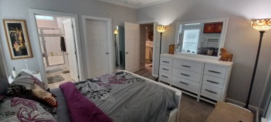 Come settle down and relax in a beautiful, manufactured home on Fairways Country Club in Florida - for sale on GolfHomes.com, golf home, golf lot