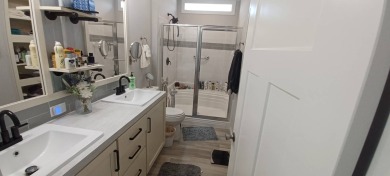 Come settle down and relax in a beautiful, manufactured home on Fairways Country Club in Florida - for sale on GolfHomes.com, golf home, golf lot