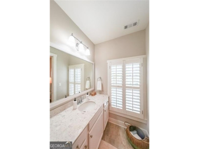 Experience timeless elegance in this stunning 5-bedroom, 5-bath on Polo Golf and Country Club in Georgia - for sale on GolfHomes.com, golf home, golf lot