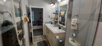 Come settle down and relax in a beautiful, manufactured home on Fairways Country Club in Florida - for sale on GolfHomes.com, golf home, golf lot