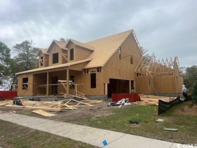 This beautiful home will be located in the popular Cherry Grove on Tidewater Golf Club and Plantation in South Carolina - for sale on GolfHomes.com, golf home, golf lot