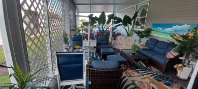 Come settle down and relax in a beautiful, manufactured home on Fairways Country Club in Florida - for sale on GolfHomes.com, golf home, golf lot