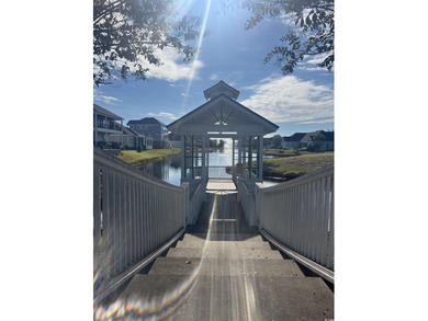 This beautiful home is located in the popular Cherry Grove on Tidewater Golf Club and Plantation in South Carolina - for sale on GolfHomes.com, golf home, golf lot