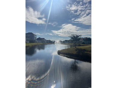 This beautiful home is located in the popular Cherry Grove on Tidewater Golf Club and Plantation in South Carolina - for sale on GolfHomes.com, golf home, golf lot