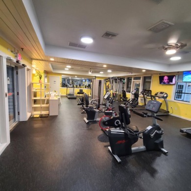 Come settle down and relax in a beautiful, manufactured home on Fairways Country Club in Florida - for sale on GolfHomes.com, golf home, golf lot