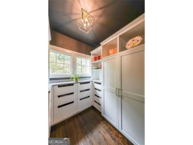 Experience timeless elegance in this stunning 5-bedroom, 5-bath on Polo Golf and Country Club in Georgia - for sale on GolfHomes.com, golf home, golf lot