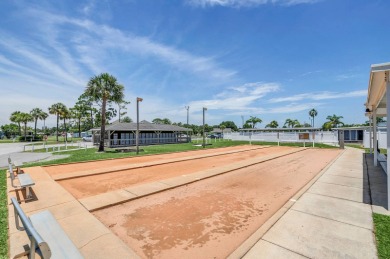 Come settle down and relax in a beautiful, manufactured home on Fairways Country Club in Florida - for sale on GolfHomes.com, golf home, golf lot