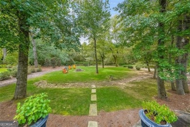 Experience timeless elegance in this stunning 5-bedroom, 5-bath on Polo Golf and Country Club in Georgia - for sale on GolfHomes.com, golf home, golf lot
