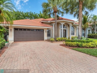 BEST PRICED HOME IN ALL OF BOCA ISLES! Beautiful, bright & on Boca Greens Country Club in Florida - for sale on GolfHomes.com, golf home, golf lot