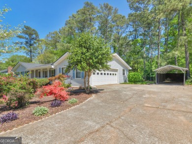Welcome to this well-maintained Ranch home with a full basement on Honey Creek Country Club in Georgia - for sale on GolfHomes.com, golf home, golf lot