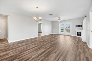 This open floor plan Laredo offers the kind of privacy that's on Glenview Championship Golf and Country Club in Florida - for sale on GolfHomes.com, golf home, golf lot