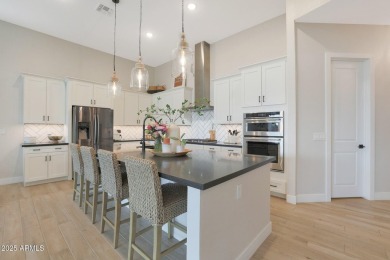 Welcome to your dream home in the highly sought-after gated on Verrado Golf Club - Victory in Arizona - for sale on GolfHomes.com, golf home, golf lot