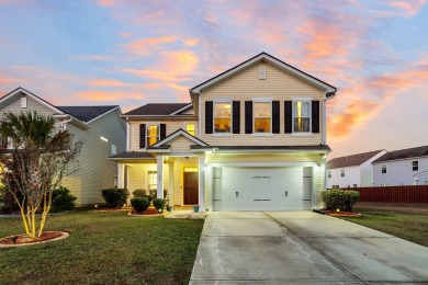 This beautiful two-story home is nestled on a pond-front lot in on Cypress Point Par 3 in South Carolina - for sale on GolfHomes.com, golf home, golf lot