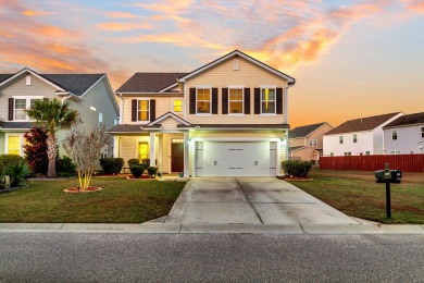 This beautiful two-story home is nestled on a pond-front lot in on Cypress Point Par 3 in South Carolina - for sale on GolfHomes.com, golf home, golf lot