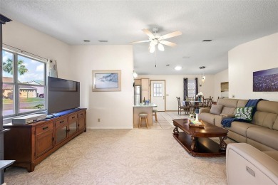 Feel Cozy in this CEDAR KEY model with BOND PAID situated in the on El Diablo Executive Golf Course in Florida - for sale on GolfHomes.com, golf home, golf lot