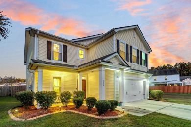 This beautiful two-story home is nestled on a pond-front lot in on Cypress Point Par 3 in South Carolina - for sale on GolfHomes.com, golf home, golf lot