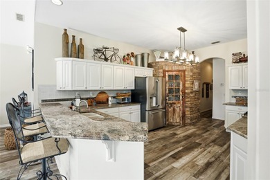 This home is a dream come true! Completely renovated with wood on Glen Abbey Golf Club in Florida - for sale on GolfHomes.com, golf home, golf lot